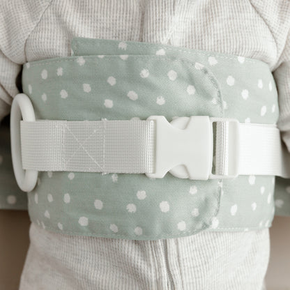 A close-up of the Sage Whimsy WriggleBum nappy change harness. 